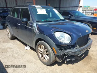 2014 MINI Countryman S with VIN WMWZC3C5XEWP27221, listed as a IAAI auction lot 41957817 with 112,353 mi miles and . Bid and sale history available at DreamBid. Image 1.