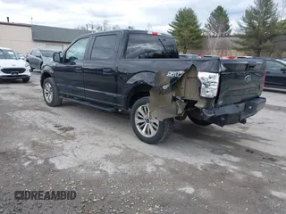 2018 Ford F-150 XL with VIN 1FTEW1EP2JFC58602, listed as a IAAI auction lot 41861045 with 149,399 mi miles. Bid and sale history available at carsss.com. Image 3.