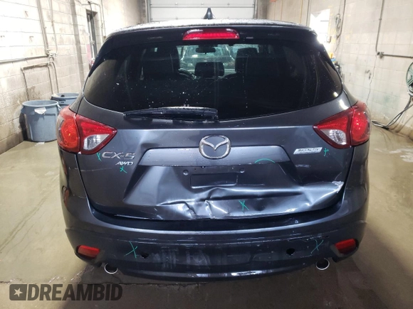 2015 Mazda CX-5 Grand Touring with VIN JM3KE4DY1F0454713, listed as a Copart auction lot 48548285 with 132,454 mi miles and Salvage Title. Bid and sale history available at DreamBid. Image 6.