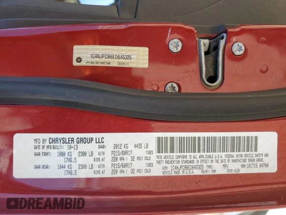2014 Jeep Patriot Limited with VIN 1C4NJPCB6ED645325, listed as a Copart auction lot 59924305 with 69,705 mi miles and Salvage title. Bid and sale history available at DreamBid. Image 13.