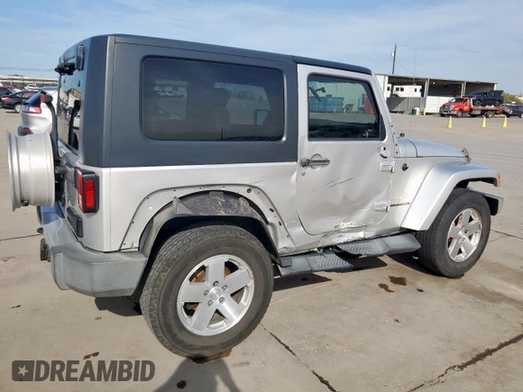 2009 Jeep Wrangler Sahara z VIN 1J4FA54169L780809, wystawiony jako Copart lot #50598925 z przebiegiem 121 078 mil mil oraz Szkoda całkowita • Salvage title. Historia ofert i sprzedaży dostępna na DreamBid. Obrazek 3.