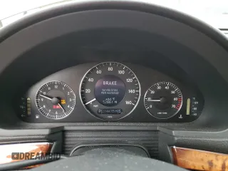 2003 Mercedes-Benz E-Class 3.2L with VIN WDBUF65J23A297936, listed as a Copart auction lot 80877004 with 214,478 mi miles and Salvage Title. Bid and sale history available at carsss.com. Image 9.