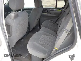 2003 GMC Envoy SLT with VIN 1GKDS13S732379218, listed as a IAAI auction lot 42164368 with Not Provided miles. Bid and sale history available at carsss.com. Image 8.