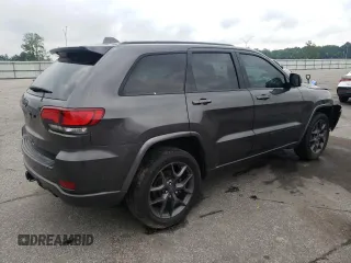 2021 Jeep Grand Cherokee 80th Anniversary z VIN 1C4RJEBG7MC679667, wystawiony jako Copart lot #54167225 z przebiegiem 77 268 mil mil oraz Szkoda całkowita • Salvage title. Historia ofert i sprzedaży dostępna na DreamBid. Obrazek 3.