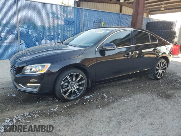 2015 Volvo S60 T5 Drive-E Premier with VIN YV140MFK0F2354299, listed as a Copart auction lot 53264405 with 72,867 mi miles and Salvage title. Bid and sale history available at DreamBid. Image 1.