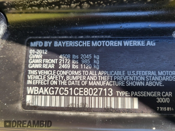2012 BMW 3 Series 335i with VIN WBAKG7C51CE802713, listed as a IAAI auction lot 42032267 with 124,349 mi miles. Bid and sale history available at carsss.com. Image 9.