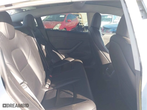 2018 Tesla Model 3 Long Range Battery with VIN 5YJ3E1EA6JF042844, listed as a IAAI auction lot 41349172 with 122,851 mi miles. Bid and sale history available at carsss.com. Image 8.