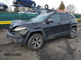 2015 Jeep Cherokee Trailhawk with VIN 1C4PJMBS9FW521872, listed as a Copart auction lot 55338955 with 146,602 mi miles and Salvage title. Bid and sale history available at DreamBid. Image 1.