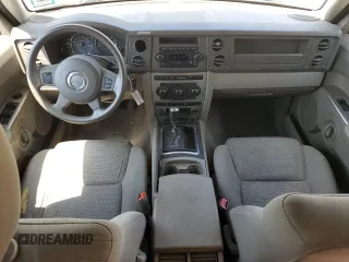 2007 Jeep Commander Sport z VIN 1J8HG48K67C651209, wystawiony jako Copart lot #64049035 z przebiegiem 216 628 mil mil oraz Szkoda całkowita • Salvage title. Historia ofert i sprzedaży dostępna na DreamBid. Obrazek 8.