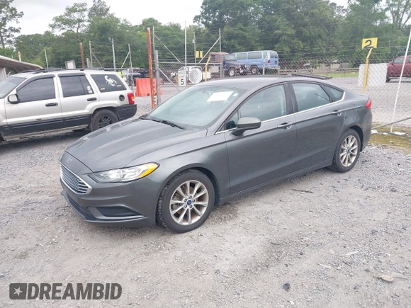 2017 Ford Fusion SE z VIN 3FA6P0HD6HR174945, wystawiony jako IAAI lot #42416548 z przebiegiem 128 410 mil mil oraz . Historia ofert i sprzedaży dostępna na DreamBid. Obrazek 2.