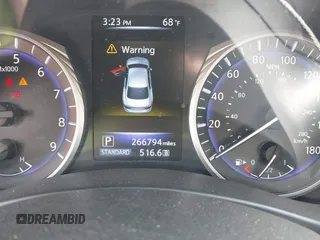 2015 Infiniti Q50 Premium with VIN JN1BV7AP0FM342504, listed as a IAAI auction lot 42127971 with 266,794 mi miles. Bid and sale history available at carsss.com. Image 7.