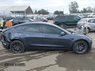 2018 Tesla Model 3 Long Range Battery with VIN 5YJ3E1EA0JF101564, listed as a IAAI auction lot 41902214 with 101,581 mi miles. Bid and sale history available at carsss.com. Image 13.
