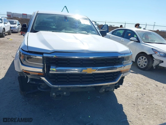 2018 Chevrolet Silverado 1500 Work Truck with VIN 1GCNCNEH0JZ107314, listed as a IAAI auction lot 41663669 with 79,609 mi miles. Bid and sale history available at carsss.com. Image 12.