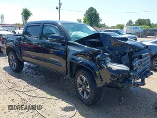 2017 Toyota Tacoma SR5 z VIN 5TFAZ5CNXHX048879, wystawiony jako IAAI lot #42157227 z przebiegiem 119 932 mil mil oraz . Historia ofert i sprzedaży dostępna na DreamBid. Obrazek 1.
