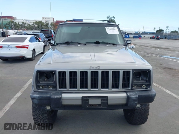 2000 Jeep Cherokee z VIN 1J4FF48S1YL200458, wystawiony jako IAAI lot #42239282 z przebiegiem Nie podano mil oraz . Historia ofert i sprzedaży dostępna na DreamBid. Obrazek 12.