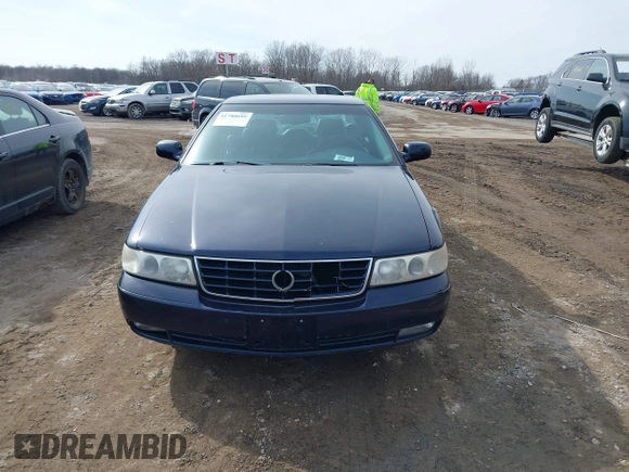 1999 Cadillac Seville Touring STS z VIN 1G6KY5493XU913994, wystawiony jako IAAI lot #41780695 z przebiegiem 60 375 mil mil oraz . Historia ofert i sprzedaży dostępna na DreamBid. Obrazek 6.