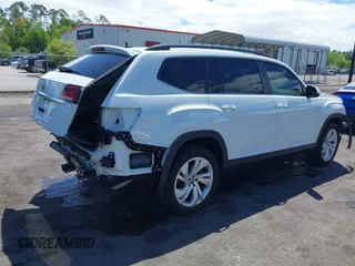 2021 Volkswagen Atlas SE z VIN 1V2WR2CA2MC529355, wystawiony jako IAAI lot #41972048 z przebiegiem 63 970 mil mil oraz . Historia ofert i sprzedaży dostępna na DreamBid. Obrazek 4.