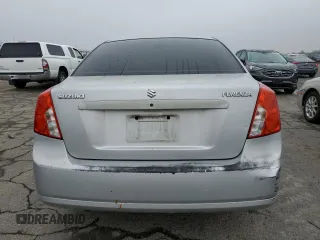 2006 Suzuki Forenza z VIN KL5JD56Z76K411376, wystawiony jako Copart lot #82751694 z przebiegiem Nie podano mil oraz Szkody całkowita. Historia ofert i sprzedaży dostępna na DreamBid. Obrazek 6.