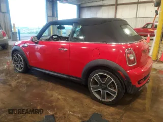 2010 MINI Convertible S with VIN WMWMS3C50ATY51636, listed as a Copart auction lot 66097715 with 103,525 mi miles and Salvage title. Bid and sale history available at DreamBid. Image 2.