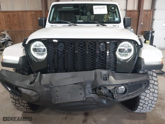 2021 Jeep Gladiator Texas Trail with VIN 1C6HJTAG3ML548261, listed as a IAAI auction lot 41791595 with 34,582 mi miles. Bid and sale history available at carsss.com. Image 6.