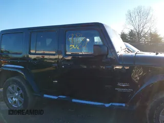 2014 Jeep Wrangler Unlimited Sahara with VIN 1C4BJWEG7EL322316, listed as a IAAI auction lot 41059508 with 144,662 mi miles. Bid and sale history available at carsss.com. Image 13.