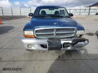 2004 Dodge Dakota SLT with VIN 1D7GL42N14S527972, listed as a Copart auction lot 86841454 with 150,784 mi miles and Salvage Title. Bid and sale history available at carsss.com. Image 5.