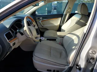 2010 Lincoln MKZ with VIN 3LNHL2GC0AR659778, listed as a Copart auction lot 52387585 with 76,655 mi miles and Salvage Title. Bid and sale history available at carsss.com. Image 7.