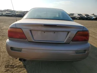 1996 Chrysler Sebring LXi z VIN 4C3AU52N4TE314534, wystawiony jako Copart lot #75043814 z przebiegiem 77 408 mil mil oraz Czysty tytuł • Clean title. Historia ofert i sprzedaży dostępna na DreamBid. Obrazek 6.