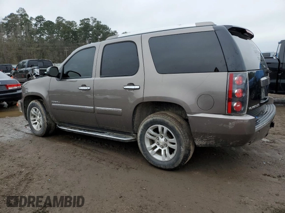 2014 GMC Yukon Denali z VIN 1GKS1EEF7ER222591, wystawiony jako Copart lot #42623745 z przebiegiem 211 992 mil mil oraz Szkoda całkowita • Salvage title. Historia ofert i sprzedaży dostępna na DreamBid. Obrazek 2.