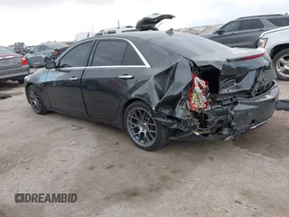 2014 Cadillac CTS Vsport Premium RWD z VIN 1G6AV5S8XE0175517, wystawiony jako IAAI lot #41126885 z przebiegiem 140 667 mil mil oraz . Historia ofert i sprzedaży dostępna na DreamBid. Obrazek 3.