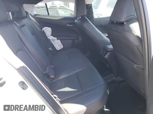 2024 Lexus UX with VIN JTHX6JBH3R2187983, listed as a Copart auction lot 73429324 with 14,549 mi miles and Salvage Title. Bid and sale history available at carsss.com. Image 10.