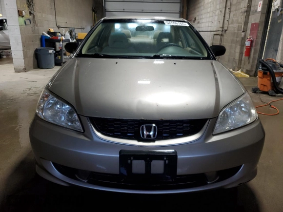 2004 Honda Civic LX z VIN 1HGEM22574L042699, wystawiony jako Copart lot #56596165 z przebiegiem 77 198 mil mil oraz Czysty tytuł • Clean title. Historia ofert i sprzedaży dostępna na DreamBid. Obrazek 5.