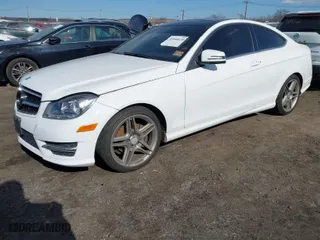 2014 Mercedes-Benz C-Class C 250 with VIN WDDGJ4HB6EG286448, listed as a IAAI auction lot 41668638 with 93,204 mi miles. Bid and sale history available at carsss.com. Image 2.