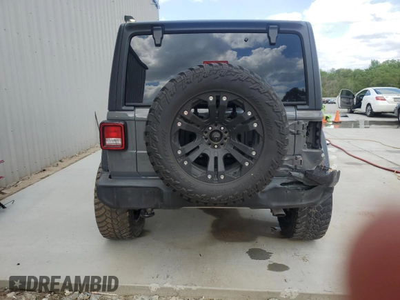 2020 Jeep Wrangler Unlimited Sport with VIN 1C4HJXDG6LW311546, listed as a Copart auction lot 51675395 with 27,679 mi miles and Salvage title. Bid and sale history available at DreamBid. Image 6.