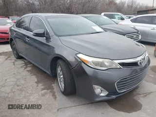 2015 Toyota Avalon Limited with VIN 4T1BK1EB1FU141126, listed as a IAAI auction lot 41433775 with 142,915 mi miles and . Bid and sale history available at carsss.com. Image 1.