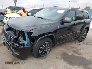 2021 Jeep Grand Cherokee Trailhawk with VIN 1C4RJFLT4MC771773, listed as a IAAI auction lot 42063954 with 17,920 mi miles and . Bid and sale history available at DreamBid. Image 17.