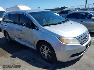 2012 Honda Odyssey EX with VIN 5FNRL5H48CB023003, listed as a IAAI auction lot 41975027 with 221,313 mi miles. Bid and sale history available at carsss.com. Image 1.