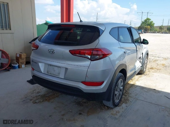 2018 Hyundai Tucson SE with VIN KM8J23A48JU646278, listed as a IAAI auction lot 41941577 with 115,228 mi miles. Bid and sale history available at carsss.com. Image 4.