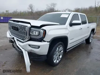 2018 GMC Sierra 1500 Denali with VIN 3GTU2PEJ4JG280332, listed as a IAAI auction lot 41784645 with 119,815 mi miles. Bid and sale history available at carsss.com. Image 2.