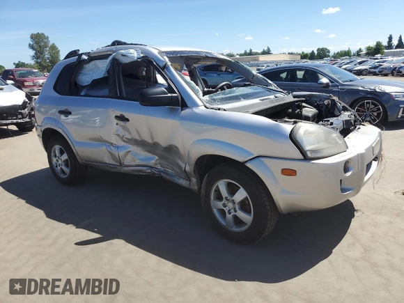 2005 Hyundai Tucson GL with VIN KM8JM12B25U076246, listed as a Copart auction lot 54030704 with 0 mi miles and Salvage Title. Bid and sale history available at carsss.com. Image 4.