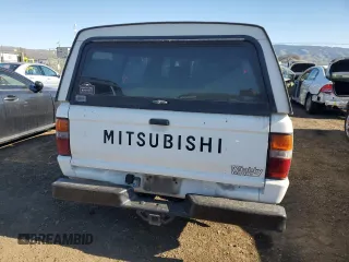 1990 Mitsubishi Mighty Max z VIN JA7FL24W3LP007688, wystawiony jako Copart lot #42651005 z przebiegiem 265 379 mil mil oraz Tytuł czysty. Historia ofert i sprzedaży dostępna na DreamBid. Obrazek 6.