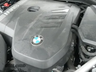 2024 BMW 5 Series 530i xDrive with VIN WBA53FJ03RCP97156, listed as a IAAI auction lot 42718766 with 34,741 mi miles and . Bid and sale history available at DreamBid. Image 24.