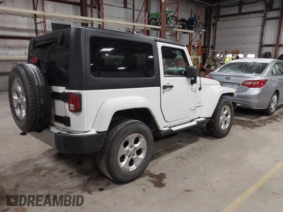 2014 Jeep Wrangler Sahara with VIN 1C4AJWBG7EL234625, listed as a IAAI auction lot 41726770 with 128,080 mi miles and . Bid and sale history available at DreamBid. Image 4.