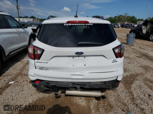 2017 Ford Escape SE z VIN 1FMCU0G95HUC35709, wystawiony jako Copart lot #58510895 z przebiegiem Nie podano mil oraz Czysty tytuł • Clean title. Historia ofert i sprzedaży dostępna na DreamBid. Obrazek 6.