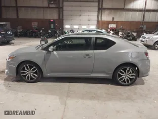 2014 Scion tC with VIN JTKJF5C72E3069294, listed as a IAAI auction lot 41291027 with 171,468 mi miles. Bid and sale history available at carsss.com. Image 14.