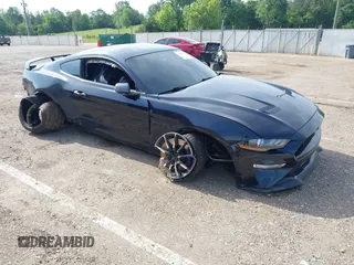 2021 Ford Mustang GT with VIN 1FA6P8CF0M5136535, listed as a IAAI auction lot 42213751 with 35,657 mi miles and . Bid and sale history available at DreamBid. Image 1.