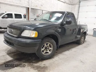 2001 Ford F-150 with VIN 2FTRF07W01CA32084, listed as a IAAI auction lot 42283557 with Not provided miles and . Bid and sale history available at DreamBid. Image 2.