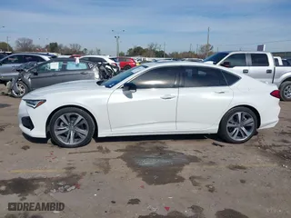 2023 Acura TLX w/Advance Package with VIN 19UUB6F65PA003881, listed as a IAAI auction lot 41360237 with 12,905 mi miles. Bid and sale history available at carsss.com. Image 14.