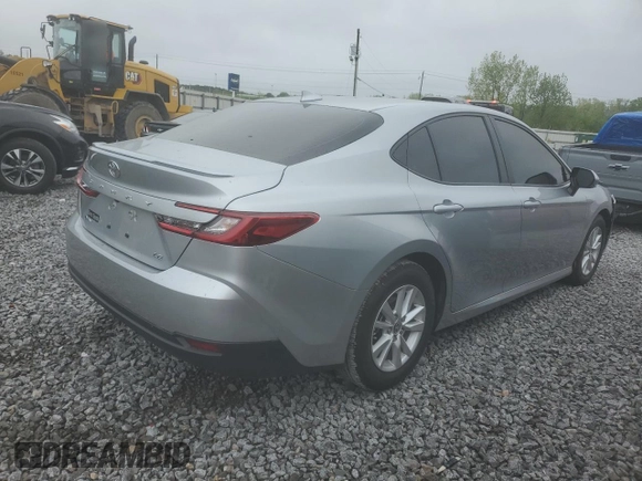 2025 Toyota Camry LE with VIN 4T1DAACKXSU043785, listed as a Copart auction lot 52207785 with 9,410 mi miles and Salvage Title. Bid and sale history available at DreamBid. Image 3.