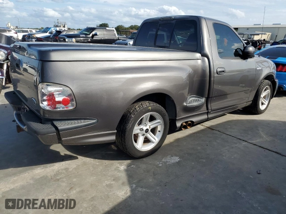 2003 Ford F-150 Lightning with VIN 2FTRF07303CA45572, listed as a Copart auction lot 74384694 with 0 mi miles and Salvage Title. Bid and sale history available at carsss.com. Image 3.